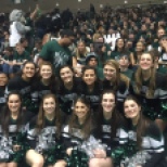 The Cheer team posed in front of the packed students section on Tuesday night